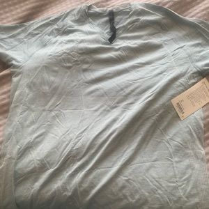 Lululemon brand new with tags. Mint green Vneck